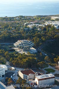 University of California San Diego, with Geisel Library (UCSD Main library) seen amid a grove of eucalyptus trees, with the Pacific Ocean in the distance, La Jolla
