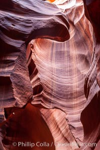 Antelope Canyon, a deep narrow slot canyon formed by water and wind erosion, Navajo Tribal Lands, Page, Arizona