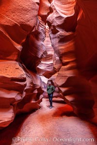 Canyoneering, hiking and exploring in Antelope Canyon slot canyon, Navajo Tribal Lands, Page, Arizona