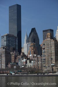 New York Citys Upper East Side, viewed from the East River. The Trump World Tower rises in the background and, in the distance, the Chrysler Building, Manhattan