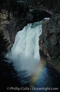 A rainbow forms in the spray from Upper Yellowstone Falls near the Grand Canyon of the Yellowstone, Yellowstone National Park, Wyoming