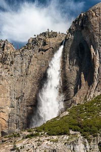 Upper Yosemite Falls near peak flow in spring. Yosemite Falls, at 2425 feet tall (730m) is the tallest waterfall in North America and fifth tallest in the world, Yosemite National Park, California