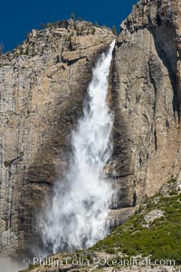Upper Yosemite Falls near peak flow in spring. Yosemite Falls, at 2425 feet tall (730m) is the tallest waterfall in North America and fifth tallest in the world, Yosemite National Park, California