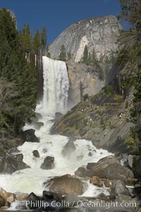 Vernal Falls and the Merced River, at peak flow in late spring.  Hikers ascending the Mist Trail visible at right.  Vernal Falls drops 317 through a joint in the narrow Little Yosemite Valley. Yosemite National Park, California, USA, natural history stock photograph, photo id 16111