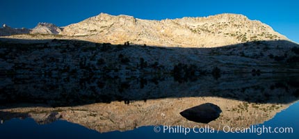 Vogelsang Peak (11500', at left) reflected in Vogelsang Lake, sunrise, Yosemite National Park, California