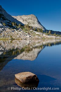 Vogelsang Peak (11500') and the shoulder of Fletcher Peak, reflected in the still morning waters of Fletcher Lake, in Yosemite's gorgeous high country, late summer.