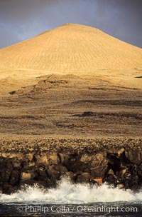 Red volcanic cinder cone at south end of Isla Guadalupe.