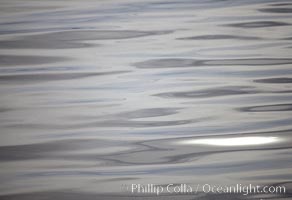 Water and light, steel gray reflections, ripples and patterns, Frederick Sound