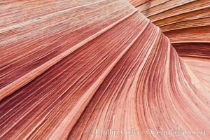 The Wave, an area of fantastic eroded sandstone featuring beautiful swirls, wild colors, countless striations, and bizarre shapes set amidst the dramatic surrounding North Coyote Buttes of Arizona and Utah.  The sandstone formations of the North Coyote Buttes, including the Wave, date from the Jurassic period. Managed by the Bureau of Land Management, the Wave is located in the Paria Canyon-Vermilion Cliffs Wilderness and is accessible on foot by permit only