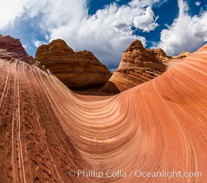 The Wave in the North Coyote Buttes, an area of fantastic eroded sandstone featuring beautiful swirls, wild colors, countless striations, and bizarre shapes set amidst the dramatic surrounding North Coyote Buttes of Arizona and Utah. The sandstone formations of the North Coyote Buttes, including the Wave, date from the Jurassic period. Managed by the Bureau of Land Management, the Wave is located in the Paria Canyon-Vermilion Cliffs Wilderness and is accessible on foot by permit only