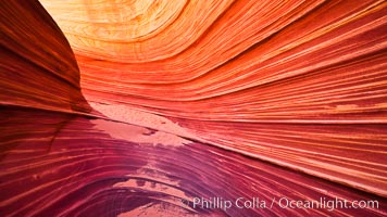 The Wave, an area of fantastic eroded sandstone featuring beautiful swirls, wild colors, countless striations, and bizarre shapes set amidst the dramatic surrounding North Coyote Buttes of Arizona and Utah.  The sandstone formations of the North Coyote Buttes, including the Wave, date from the Jurassic period. Managed by the Bureau of Land Management, the Wave is located in the Paria Canyon-Vermilion Cliffs Wilderness and is accessible on foot by permit only