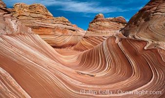 The Wave, an area of fantastic eroded sandstone featuring beautiful swirls, wild colors, countless striations, and bizarre shapes set amidst the dramatic surrounding North Coyote Buttes of Arizona and Utah.  The sandstone formations of the North Coyote Buttes, including the Wave, date from the Jurassic period. Managed by the Bureau of Land Management, the Wave is located in the Paria Canyon-Vermilion Cliffs Wilderness and is accessible on foot by permit only.