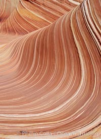 The Wave, an area of fantastic eroded sandstone featuring beautiful swirls, wild colors, countless striations, and bizarre shapes set amidst the dramatic surrounding North Coyote Buttes of Arizona and Utah.  The sandstone formations of the North Coyote Buttes, including the Wave, date from the Jurassic period. Managed by the Bureau of Land Management, the Wave is located in the Paria Canyon-Vermilion Cliffs Wilderness and is accessible on foot by permit only