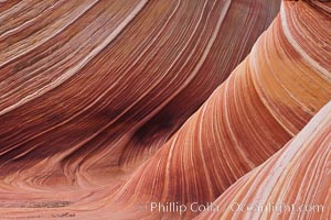 The Wave, an area of fantastic eroded sandstone featuring beautiful swirls, wild colors, countless striations, and bizarre shapes set amidst the dramatic surrounding North Coyote Buttes of Arizona and Utah.  The sandstone formations of the North Coyote Buttes, including the Wave, date from the Jurassic period. Managed by the Bureau of Land Management, the Wave is located in the Paria Canyon-Vermilion Cliffs Wilderness and is accessible on foot by permit only