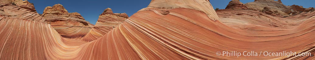 Panorama of the Wave.  The Wave is a sweeping, dramatic display of eroded sandstone, forged by eons of water and wind erosion, laying bare striations formed from compacted sand dunes over millenia.  This panoramic picture is formed from nine individual photographs, North Coyote Buttes, Paria Canyon-Vermilion Cliffs Wilderness, Arizona