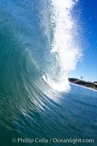 Wave breaking in early morning sunlight, Ponto, Carlsbad, California