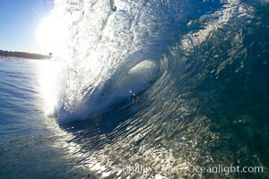 Wave breaking in early morning sunlight, Ponto, Carlsbad, California