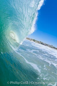 Breaking wave, tube, hollow barrel, morning surf.