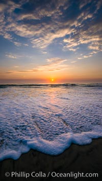 Waves rush in at sunset, Carlsbad beach sunset and ocean waves, seascape, dusk, summer.