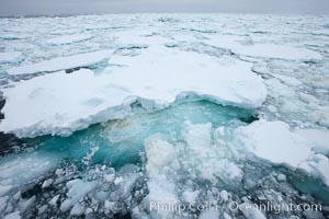 Pack ice and brash ice fills the Weddell Sea, near the Antarctic Peninsula.  This pack ice is a combination of broken pieces of icebergs, sea ice that has formed on the ocean