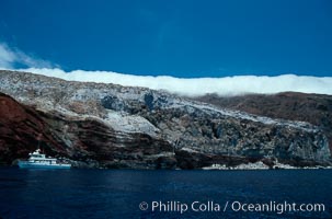Boat Horizon near Spanish Cove, clouds held back by island crest. Guadalupe Island (Isla Guadalupe), Baja California, Mexico, natural history stock photograph, photo id 03691
