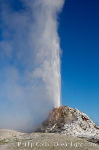 White Dome Geyser rises to a height of 30 feet or more, and typically erupts with an interval of 15 to 30 minutes.  It is located along Firehole Lake Drive, Lower Geyser Basin, Yellowstone National Park, Wyoming