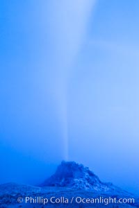 White Dome Geyser, rises to a height of 30 feet or more, and typically erupts with an interval of 15 to 30 minutes. It is located along Firehole Lake Drive.