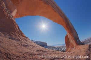 Wilson Arch rises high above route 191 in eastern Utah, with a span of 91 feet and a height of 46 feet. USA, natural history stock photograph, photo id 18031