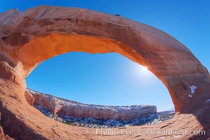Wilson Arch rises high above route 191 in eastern Utah, with a span of 91 feet and a height of 46 feet