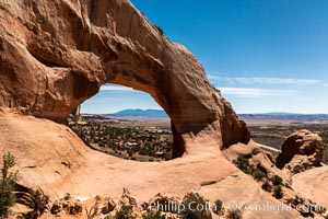 Wilson Arch aerial photo, Moab, Utah. Wilson Arch has a span of 91 feet (28 m) and height of 46 feet (14 m)