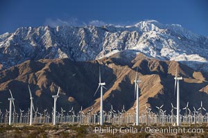 Wind turbines and Mount San Jacinto, rise above the flat floor of the San Gorgonio Pass near Palm Springs, provide electricity to Palm Springs and the Coachella Valley