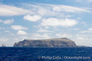 Wolf Island is the largest of the islands in the distant northern island group of the Galapagos archipelago, is home to hundreds of thousands of seabirds.  Vast schools of sharks and fish inhabit the waters surrounding Wolf Island