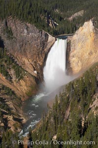 Lower Falls of the Yellowstone River.  At 308 feet, the Lower Falls of the Yellowstone River is the tallest fall in the park.  This view is from Lookout Point on the North side of the Grand Canyon of the Yellowstone.  The canyon is approximately 10,000 years old, 20 miles long, 1000 ft deep, and 2500 ft wide.  Its yellow, orange and red-colored walls are due to oxidation of the various iron compounds in the soil, and to a lesser degree, sulfur content, Yellowstone National Park, Wyoming