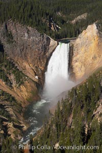 Lower Falls of the Yellowstone River.  At 308 feet, the Lower Falls of the Yellowstone River is the tallest fall in the park.  This view is from Lookout Point on the North side of the Grand Canyon of the Yellowstone.  The canyon is approximately 10,000 years old, 20 miles long, 1000 ft deep, and 2500 ft wide.  Its yellow, orange and red-colored walls are due to oxidation of the various iron compounds in the soil, and to a lesser degree, sulfur content, Yellowstone National Park, Wyoming