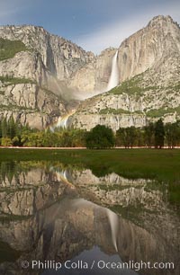 Yosemite Falls at night with faint lunar rainbow, Yosemite National Park.