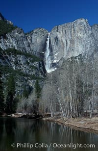 Yosemite Falls viewed from swinging bridge over Merced River, winter, Yosemite Valley, Yosemite National Park, California