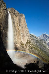 Yosemite Falls and rainbow, Half Dome in distance, viewed from the Yosemite Falls trail, spring.