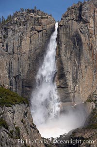 Upper Yosemite Falls near peak flow in spring.  Yosemite Falls, at 2425 feet tall (730m) is the tallest waterfall in North America and fifth tallest in the world.  Yosemite Valley, Yosemite National Park, California