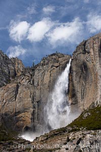 Upper Yosemite Falls near peak flow in spring.  Yosemite Falls, at 2425 feet tall (730m) is the tallest waterfall in North America and fifth tallest in the world.  Yosemite Valley, Yosemite National Park, California