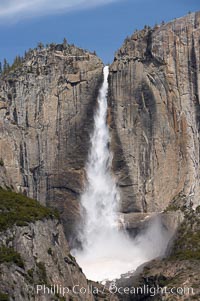 Upper Yosemite Falls near peak flow in spring.  Yosemite Falls, at 2425 feet tall (730m) is the tallest waterfall in North America and fifth tallest in the world.  Yosemite Valley, Yosemite National Park, California