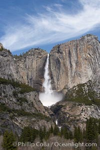 Upper Yosemite Falls near peak flow in spring.  Yosemite Falls, at 2425 feet tall (730m) is the tallest waterfall in North America and fifth tallest in the world.  Yosemite Valley, Yosemite National Park, California