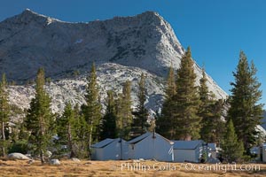 Vogelsang Peak (11500') rises above Vogelsang High Sierra Camp, in Yosemite's high country, with semi-permanent tent cabins serving camp visitors seen in the foreground, Yosemite National Park, California
