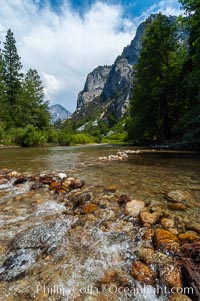 The South Fork of the Kings River flows through Kings Canyon National Park, in the southeastern Sierra mountain range. Grand Sentinel, a huge granite monolith, is visible on the right above pine trees. Late summer, Sequoia Kings Canyon National Park, California