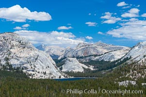 Tenaya Lake is surrounded by epic granite domes, with Polly Dome on the left.  Late afternoon, viewed from Olmsted Point, Yosemite National Park, California