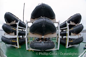 Zodiac boats are stacked on the top deck of the ship M/V Polar Star.  They are lowered into the water for passengers to go ashore and explore