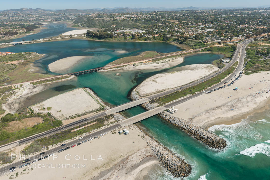 Aerial photo of Batiquitos Lagoon, Carlsbad. The Batiquitos Lagoon is a coastal wetland in southern Carlsbad, California. Part of the lagoon is designated as the Batiquitos Lagoon State Marine Conservation Area, run by the California Department of Fish and Game as a nature reserve. Callifornia, USA, natural history stock photograph, photo id 30570