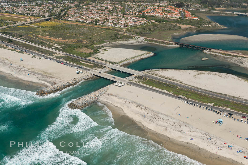 Aerial photo of Batiquitos Lagoon, Carlsbad. The Batiquitos Lagoon is a coastal wetland in southern Carlsbad, California. Part of the lagoon is designated as the Batiquitos Lagoon State Marine Conservation Area, run by the California Department of Fish and Game as a nature reserve. Callifornia, USA, natural history stock photograph, photo id 30556