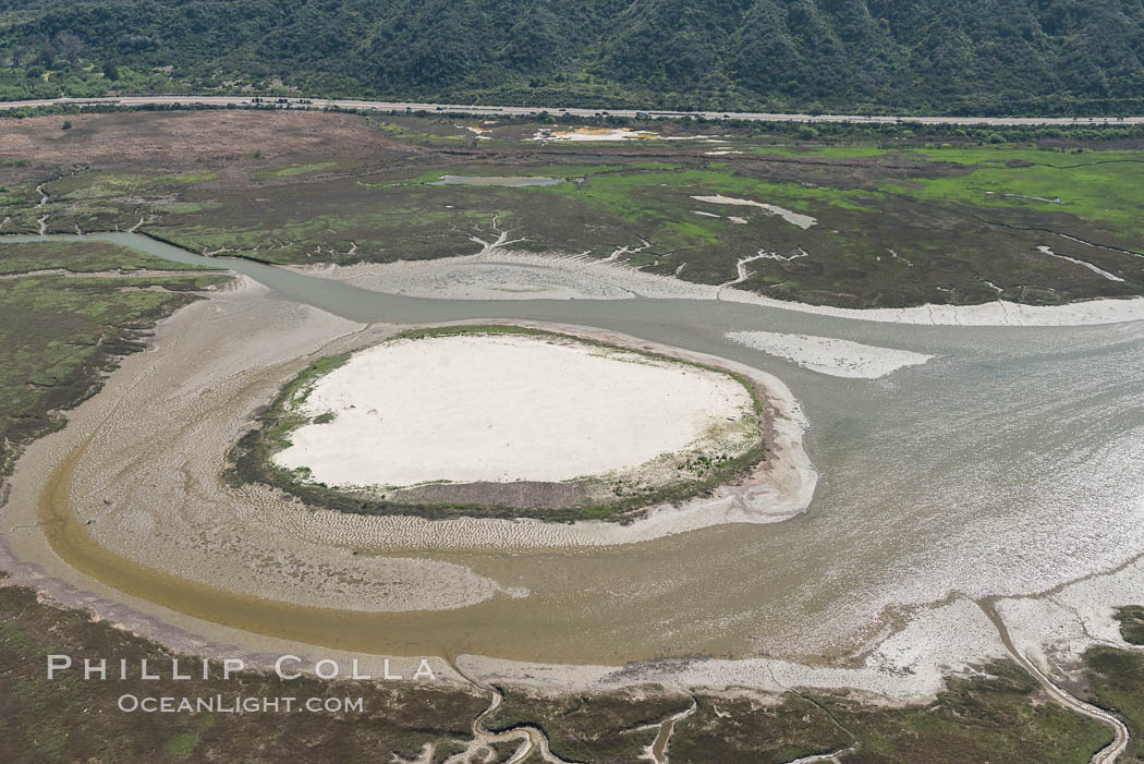 Aerial photo of Batiquitos Lagoon, Carlsbad. The Batiquitos Lagoon is a coastal wetland in southern Carlsbad, California. Part of the lagoon is designated as the Batiquitos Lagoon State Marine Conservation Area, run by the California Department of Fish and Game as a nature reserve. Callifornia, USA, natural history stock photograph, photo id 30564