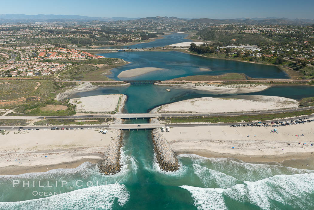 Aerial photo of Batiquitos Lagoon, Carlsbad. The Batiquitos Lagoon is a coastal wetland in southern Carlsbad, California. Part of the lagoon is designated as the Batiquitos Lagoon State Marine Conservation Area, run by the California Department of Fish and Game as a nature reserve. Callifornia, USA, natural history stock photograph, photo id 30555