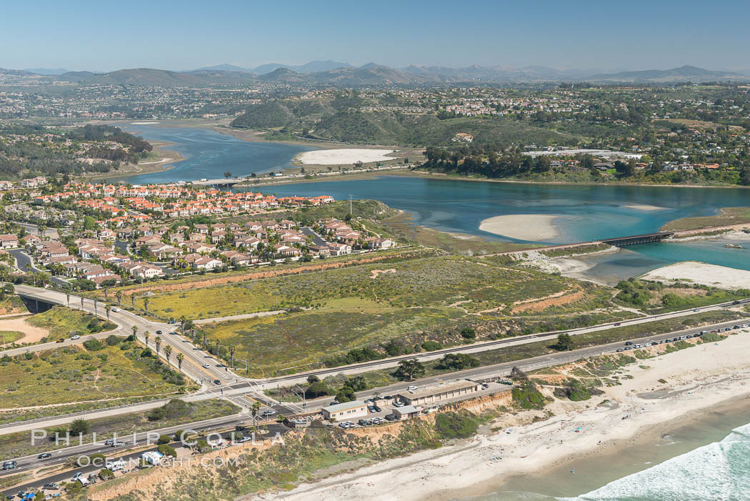 Aerial photo of Batiquitos Lagoon, Carlsbad. The Batiquitos Lagoon is a coastal wetland in southern Carlsbad, California. Part of the lagoon is designated as the Batiquitos Lagoon State Marine Conservation Area, run by the California Department of Fish and Game as a nature reserve. Callifornia, USA, natural history stock photograph, photo id 30553
